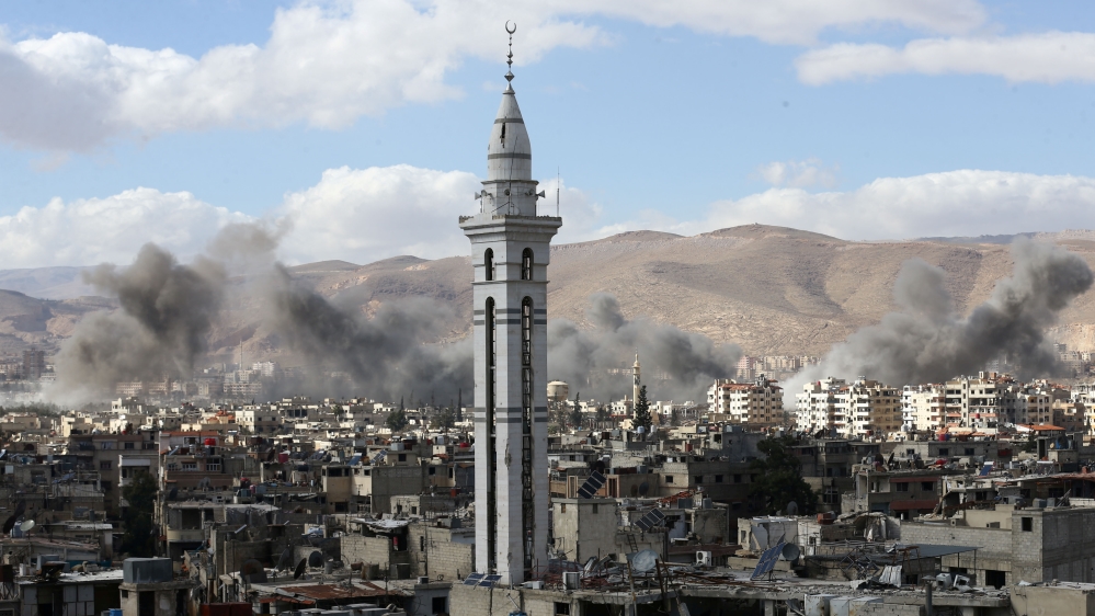 Smoke rises from the besieged Eastern Ghouta in Damascus