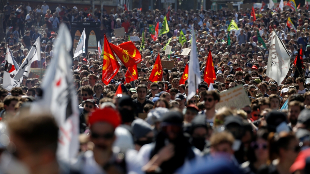People attend a demonstration against the French government''s reform plans as part of a national day of protest, in Nantes