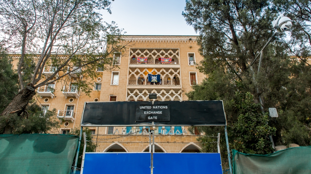 Ledra Palace Hotel is located in the UN buffer zone between the Greek and Turkish Cypriot checkpoints [Dimitris Sideridis/Al Jazeera]