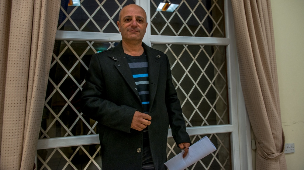 Kursut Tilki has been a maestro in the choir for 13 years [Dimitris Sideridis/Al Jazeera]