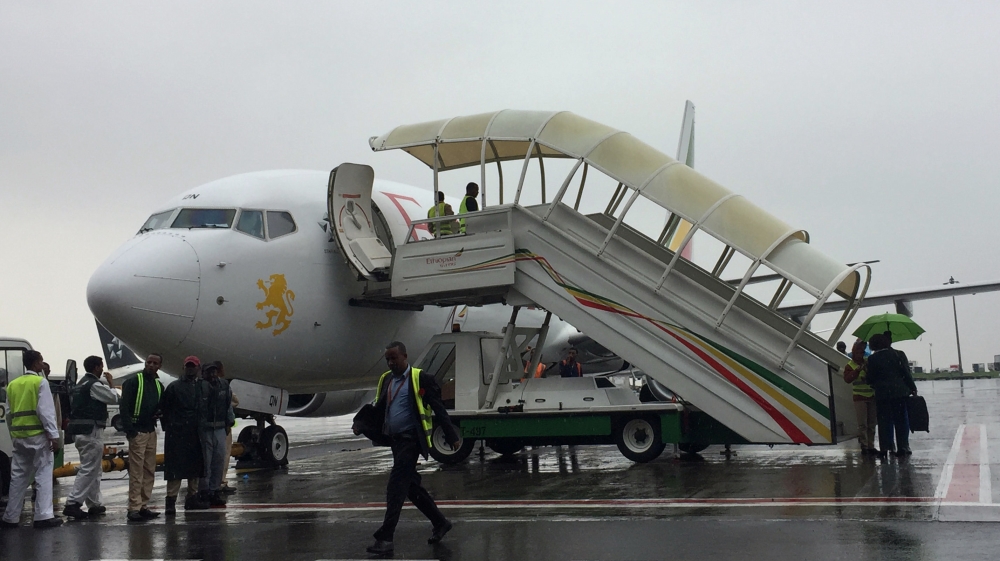 Ethiopian Airlines staff prepare their plane as they resume flights to Eritrea''s capital Asmara at the Bole International Airport in Addis Ababa