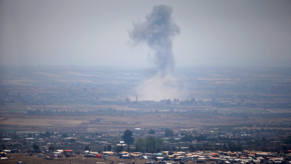 Smoke following an explosion in Syria is seen from the Israeli-occupied Golan Heights near the Israeli Syrian border