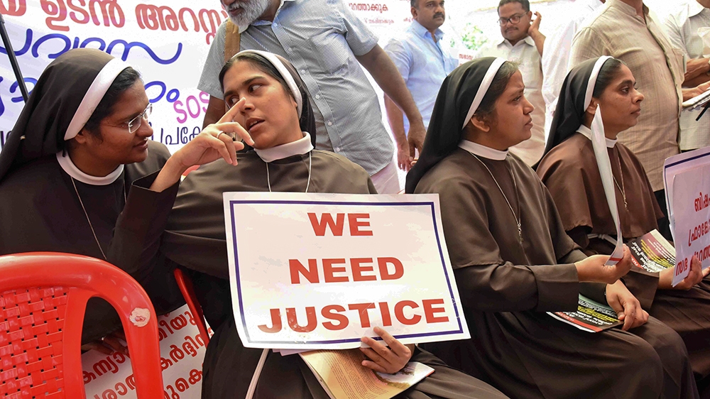 Catholic nuns hold placards demanding the arrest of a bishop who one nun has accused of rape, during a public protest in Kochi, Kerala, India, Wednesday, Sept. 12, 2018. The protest that began last we