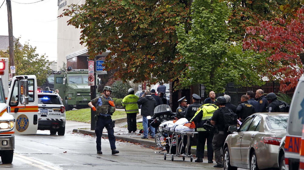 First responders surround the Tree of Life synagogue in Pittsburgh, Pennsylvania where a shooter opened fire on Saturday, October 27, 2018