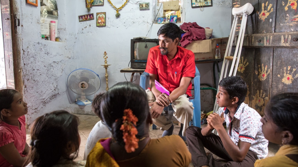 Raja visits children whose father is serving a life sentence for a murder. The prisoner's wife suffers from mental illness. Raja, with the help of a private company, has been giving the family $40 a month for food and schooling. Recently, he arranged parole time for the man to visit his wife when she was ill [Credit: Global Network for Equality]