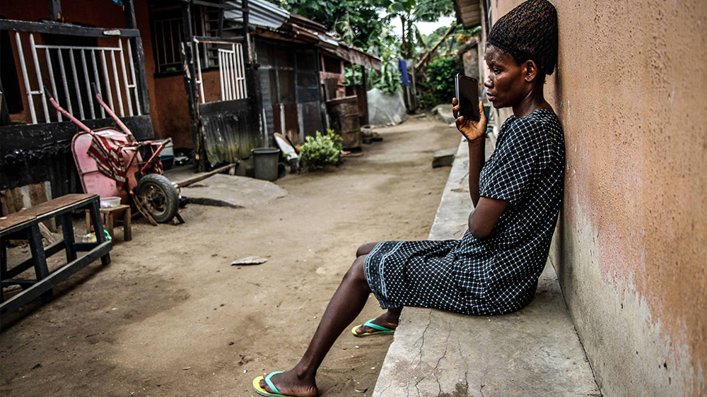 Theresa hasn't spoken to her son Emmanuel for five months after he was accused of witchcraft by his stepfather [Marc Ellison/Al Jazeera]