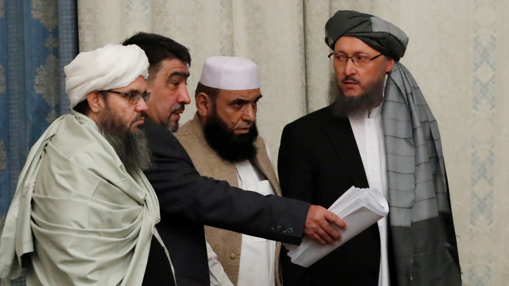 Members of Taliban delegation take their seats during the multilateral peace talks on Afghanistan in Moscow
