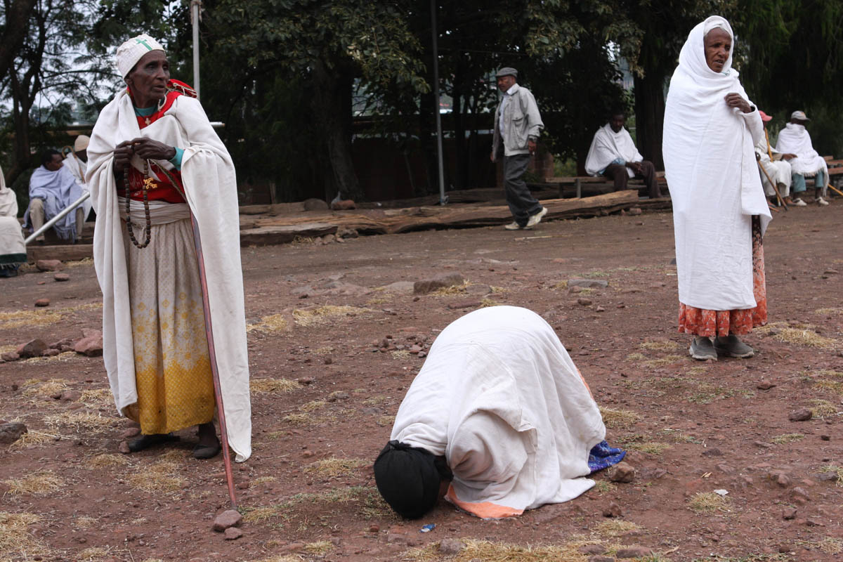 A common sight around the churches is to see worshippers, regardless of age, dropping to the ground in supplication and touching what they deem holy ground with their head three times in honor of the