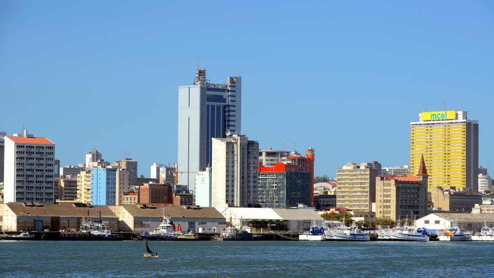 Fishing boats sit beneath the skyline of Mozambique''s capital Maputo
