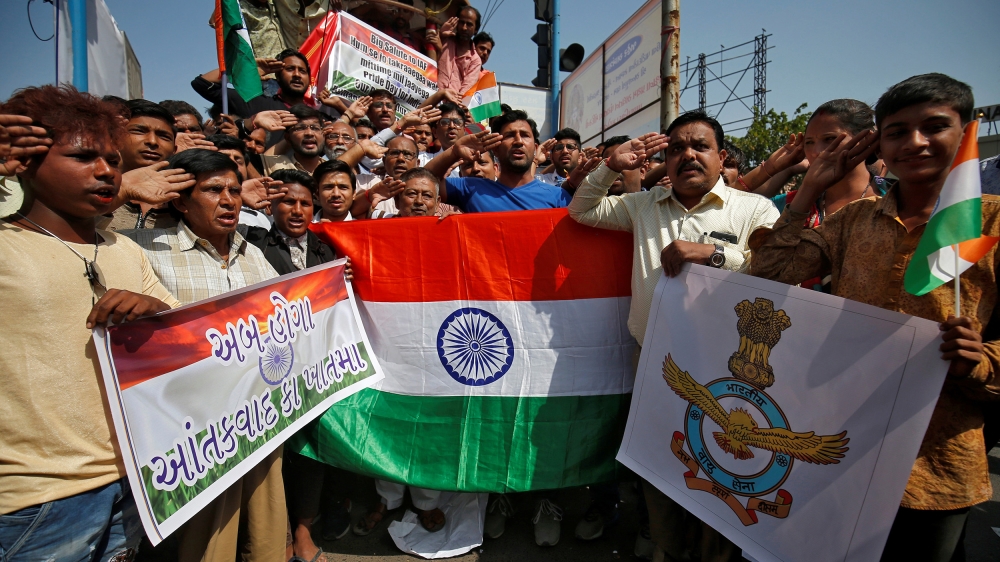 People across Indian cities celebrated the bombing of targets inside Pakistan [Amit Dave/Reuters]