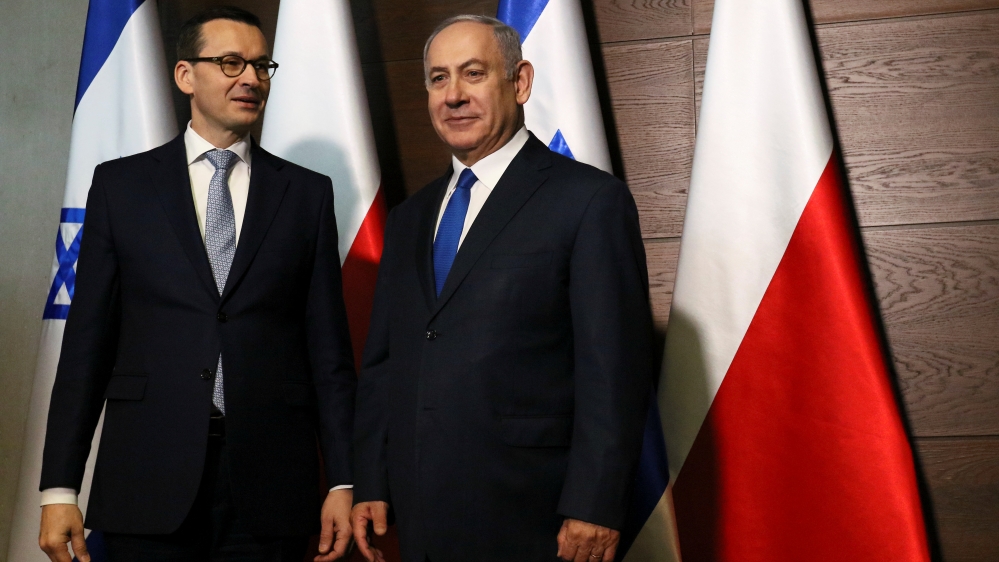 Israeli PM Netanyahu poses for pictures with Poland''s PM Morawiecki during the Middle East summit in Warsaw