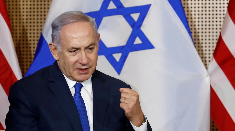 Israeli Prime Minister Benjamin Netanyahu speaks as he meets with U.S. Vice President Mike Pence in Warsaw