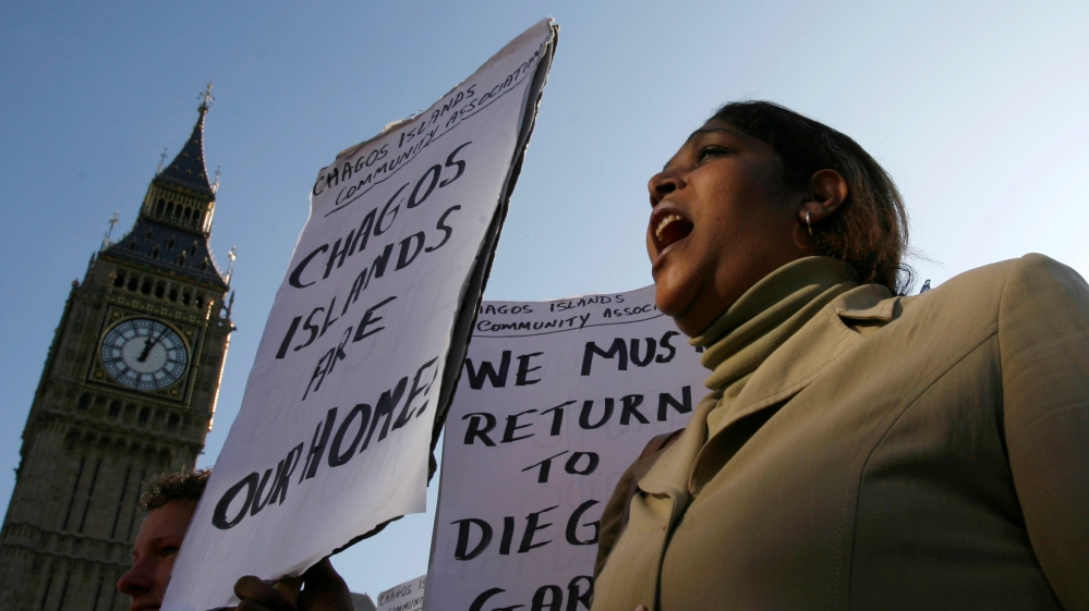 Demonstrator demanding her return to the Chagos Islands in the Diego Garcia archipelago shouts during a protest outside the Houses of Parliament in London