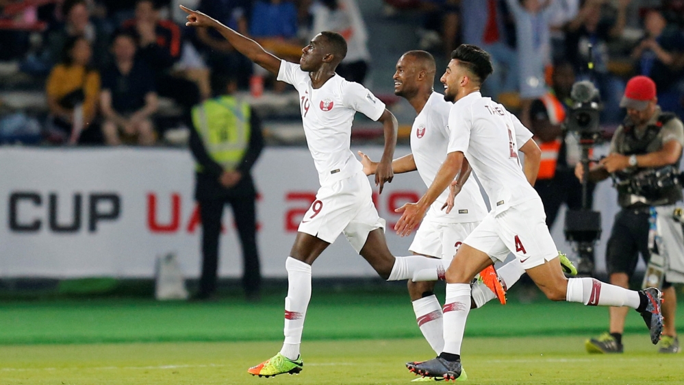 Qatar's Almoez Ali was the tournament's top scorer with nine goals [Thaier Al-Sudani/Reuters]