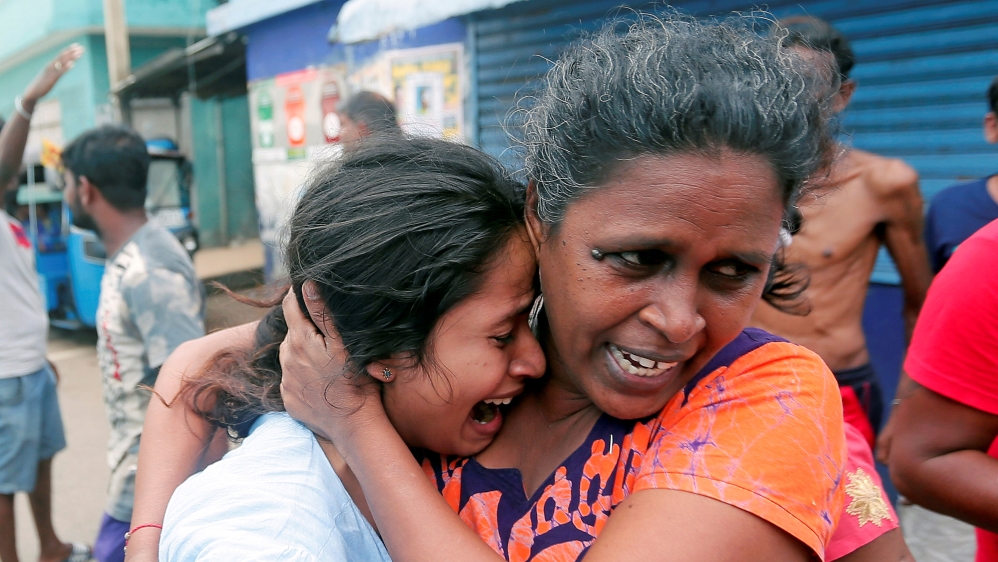 Nearly 300 people were killed in Sunday's attacks [Dinuka Liyanawatte/Reuters]