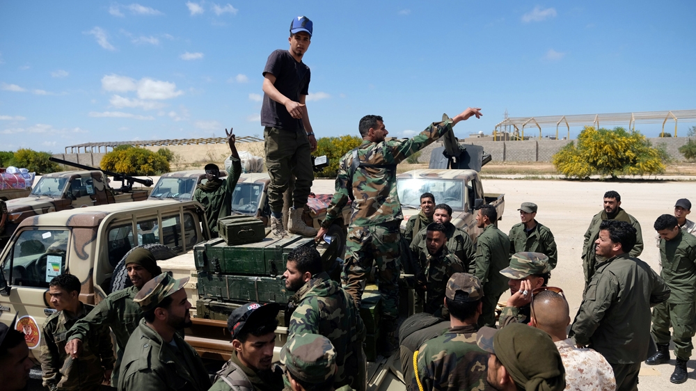LNA members, commanded by Haftar, head out of Benghazi to reinforce the troops advancing to Tripoli [Esam Omran Al-Fetori/Reuters]