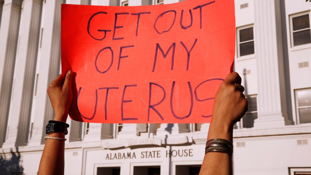 Pro-abortion rights supporters protest in front of the Alabama State House as Alabama state Senate votes on the strictest anti-abortion rights bill in the United States at the Alabama Legislature in Montgomery, Alabama