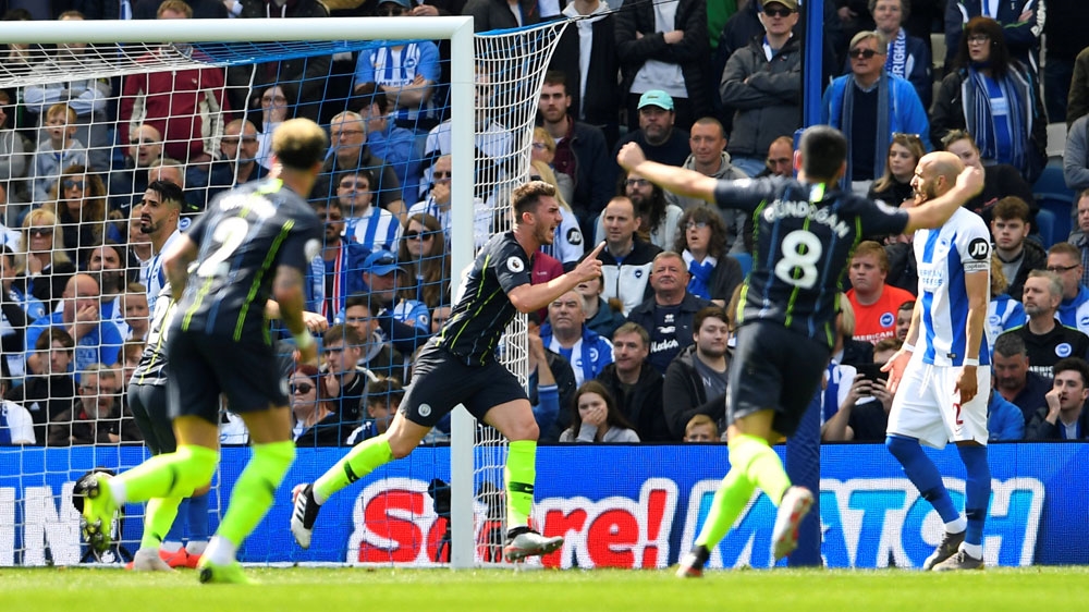 Laporte gave City the lead at the 38th minute after netting in Mahrez' corner [Toby Melville/Reuters]