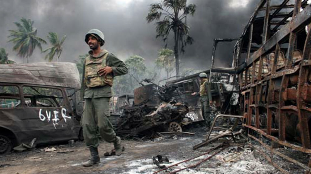 This photograph was released by Sri Lanka's military on the day the government declared victory over the Tamil Tiger rebels. Rajapaksa is seen as the architect of the victory [Reuters]