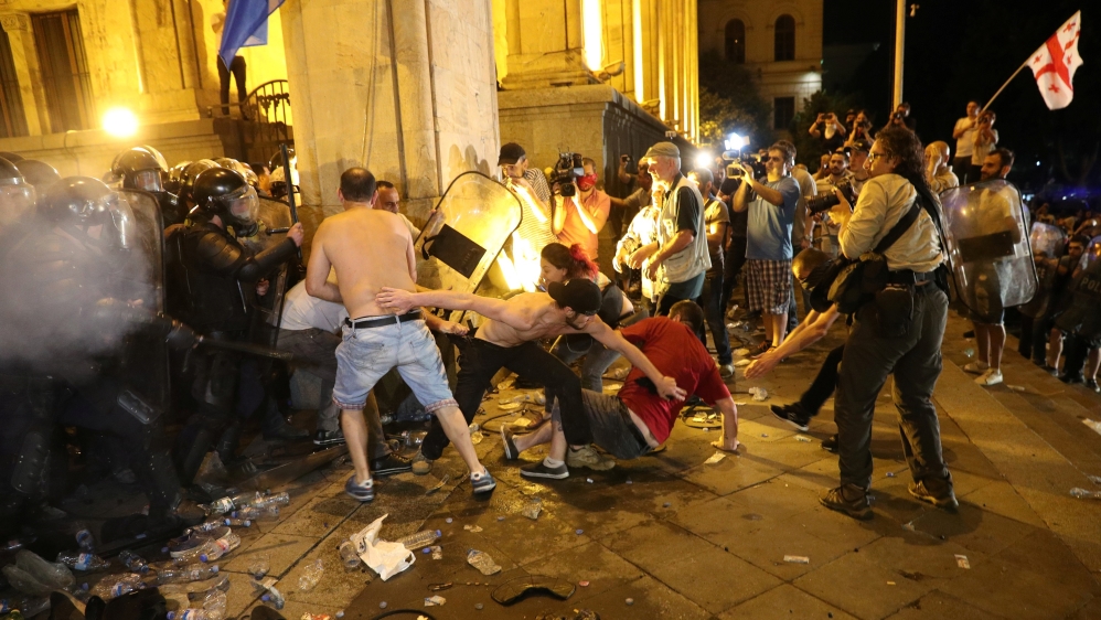 Protesters clash with riot policemen outside the parliament building during a rally against a Russian lawmaker''s visit in Tbilisi, Georgia June 21, 2019