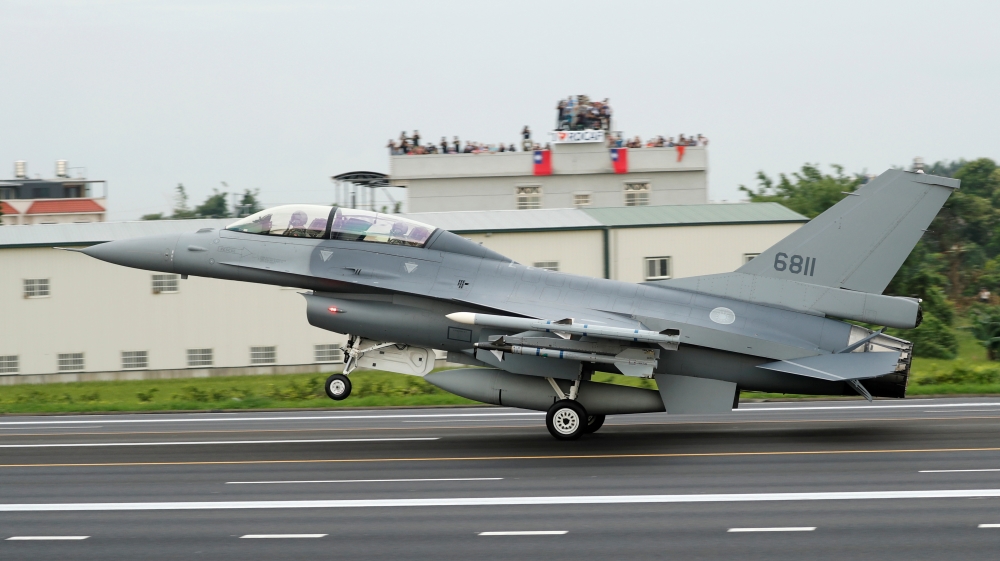 A ROCAF F-16V fighter jet lands on a highway used as an emergency runway during the Han Kuang military exercise simulating the China''s People''s Liberation Army (PLA) invading the island, in Changhua