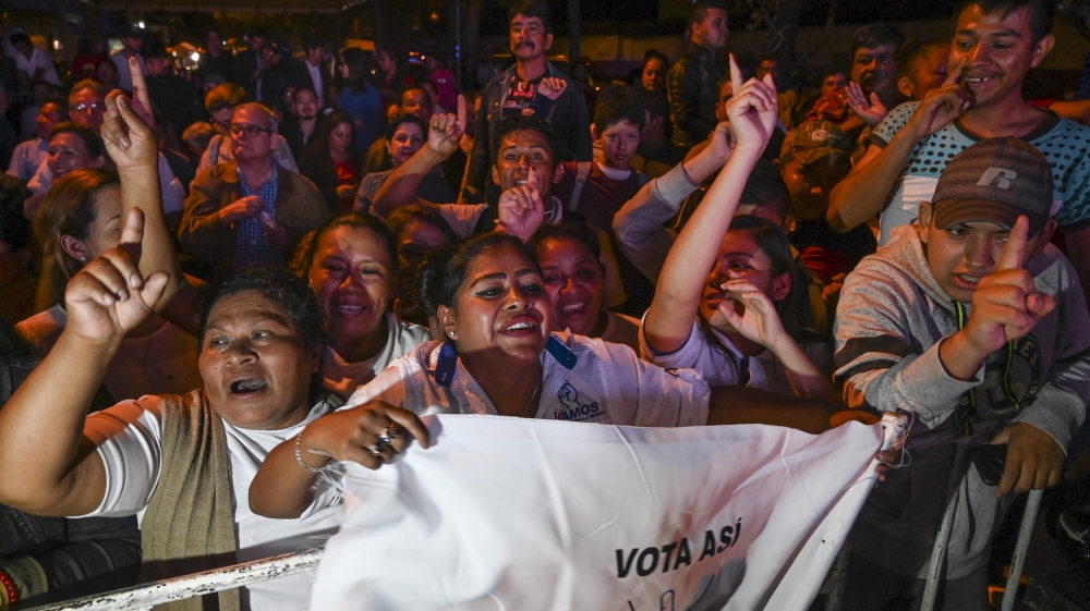 Supporters of Giammattei celebrate in Guatemala City following his victory on Sunday