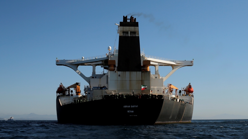Iranian flag flies at Iranian oil tanker Adrian Darya 1, before being named as Grace 1, as it sits anchored after the Supreme Court of the British territory lifted its detention order