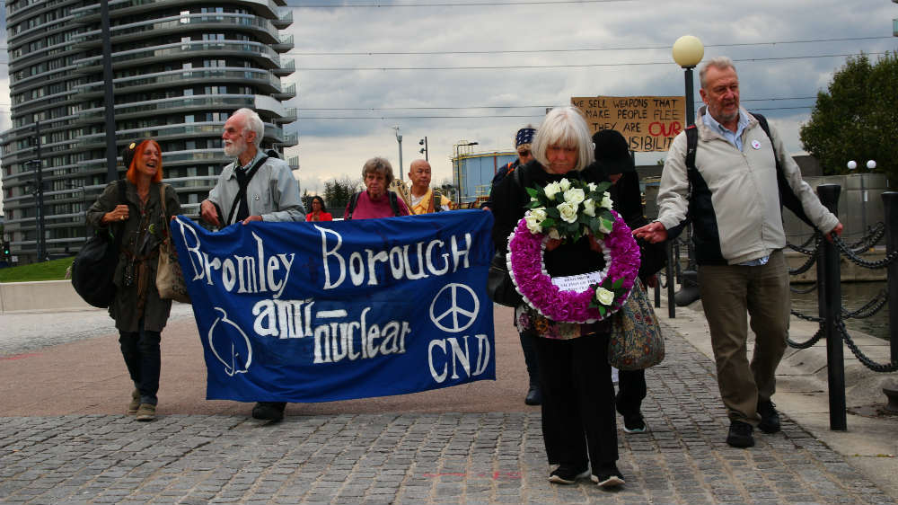 Activists laid a wreath to commemorate victims of weapons sold at previous DSEI arms fairs