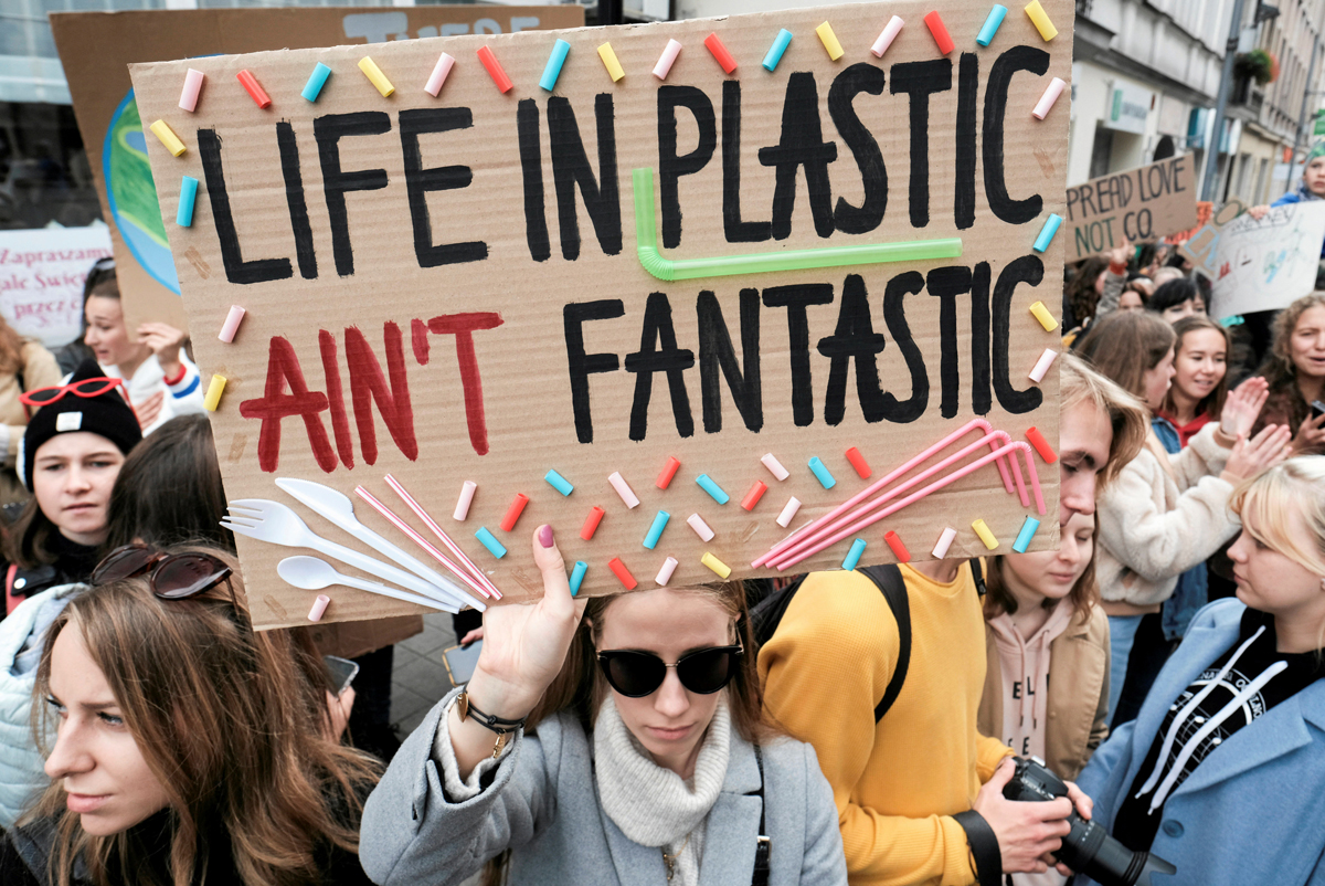 Activists take part in the Global Climate Strike in Poznan