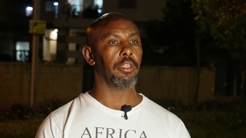 Gil Elias, a lifeguard from Hirzilay, has protested regularly since the killing of Ethiopian Israeli teenager Solomon Teka at the hands of a policeman in July