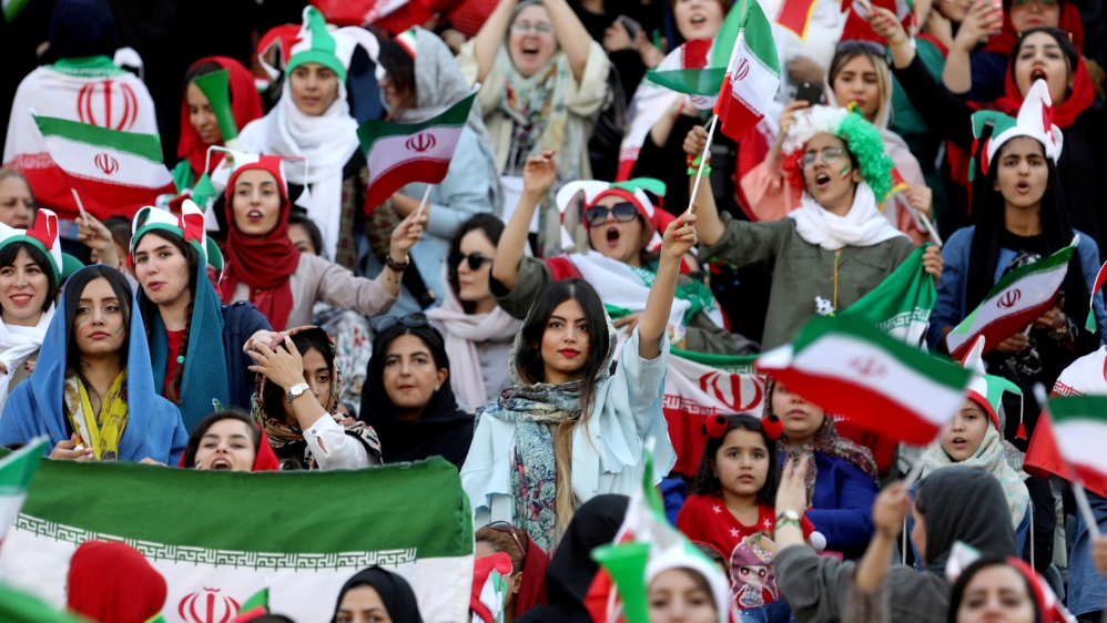 Iranian women attend Iran''s World Cup Asian qualifier against Cambodia at the Azadi stadium in Tehran