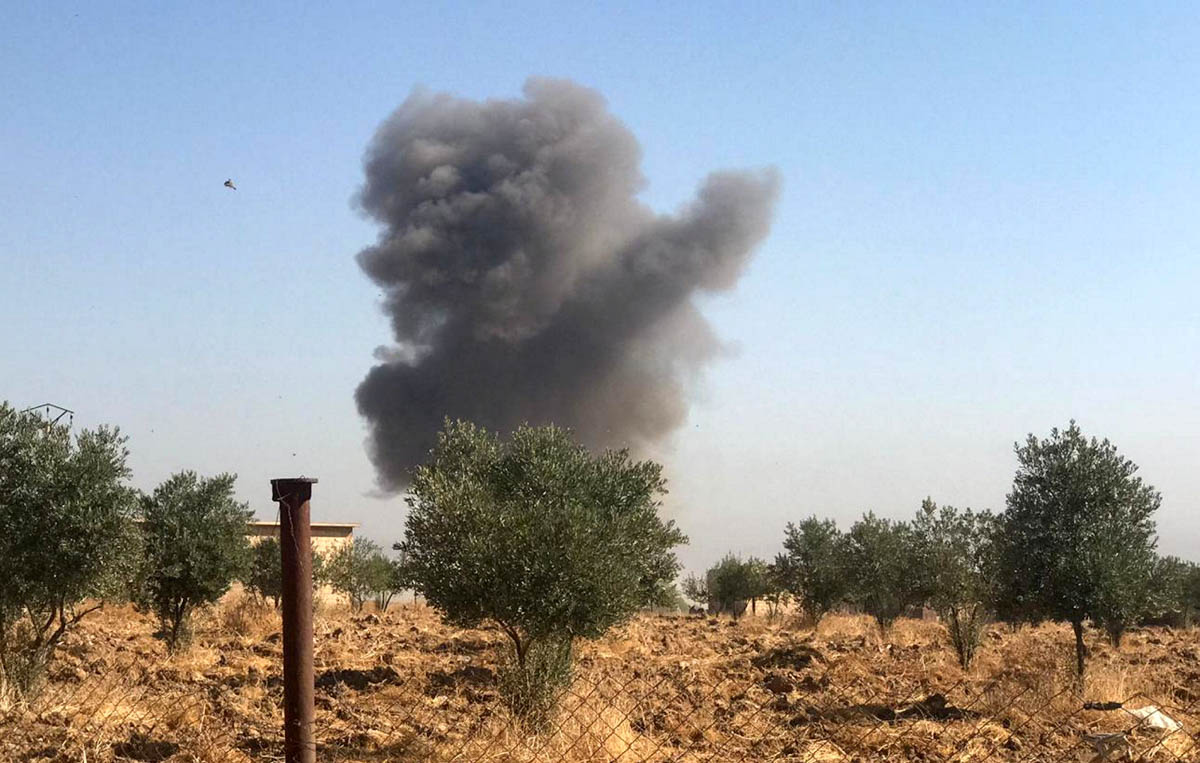 Smoke rises from Tel Arkam village in Ras al Ain countryside, Syria October 10, 2019. REUTERS/Stringer
