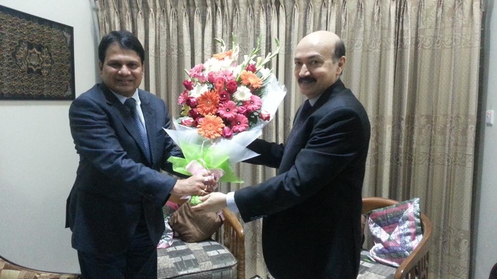 Khan, left, with former business associate and Prime Minister Sheikh Hasina’s security adviser Siddique, who is accused of ordering the detention of the three men [Al Jazeera]