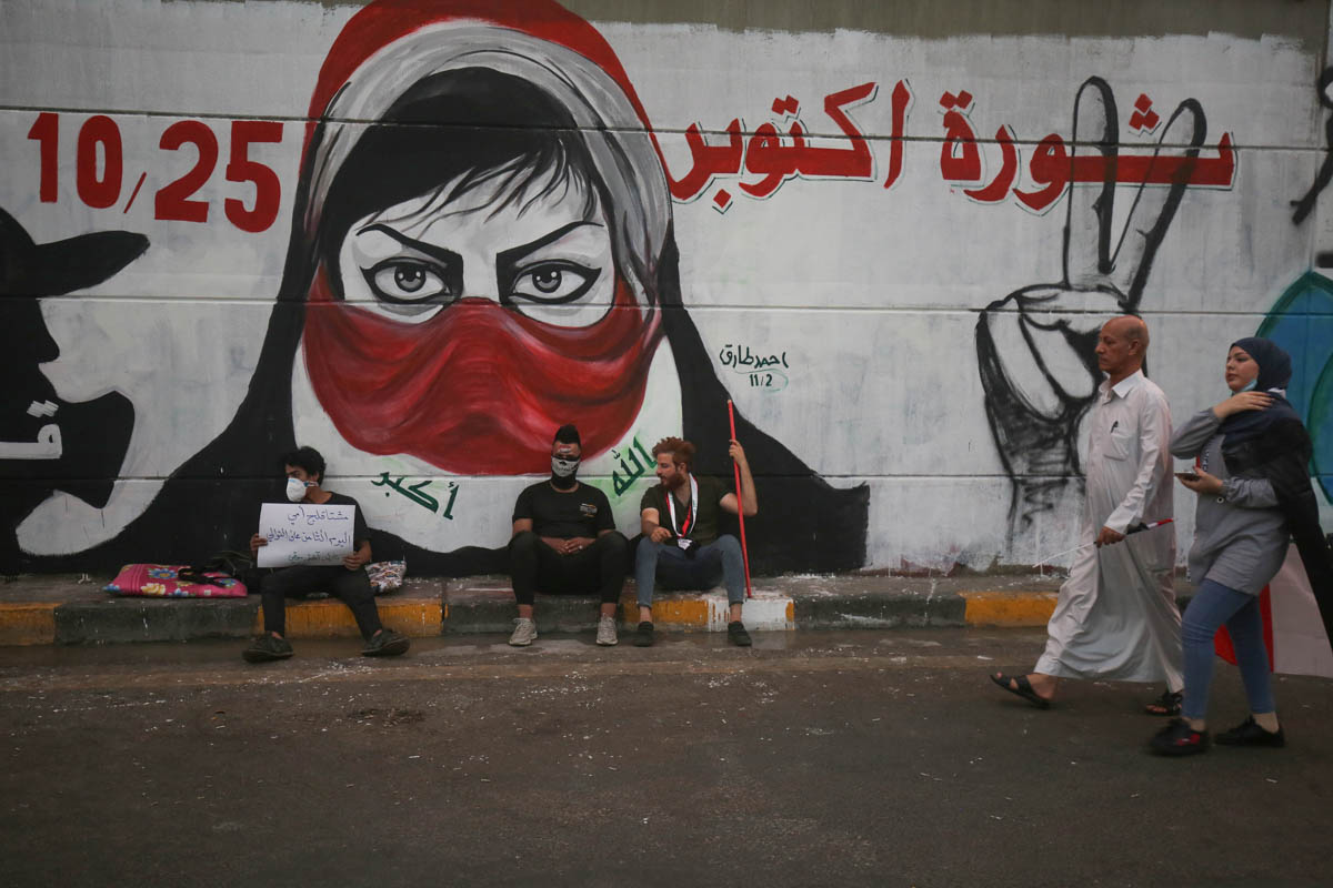 Iraqi protesters rest at Baghdad''s Tahrir square during ongoing anti-government demonstrations on November 2, 2019. Iraqi security forces clashed with anti-government protesters in the early hours of
