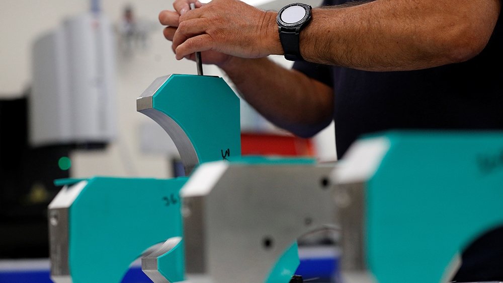 An engineer carries out quality control work on steel parts at Swiftool Precision Engineering Ltd''s facility near Mansfield, Britain, October 30, 2019