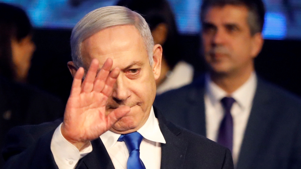 Israeli Prime Minister Benjamin Netanyahu addresses members of his right-wing party bloc at a conference in Tel Aviv