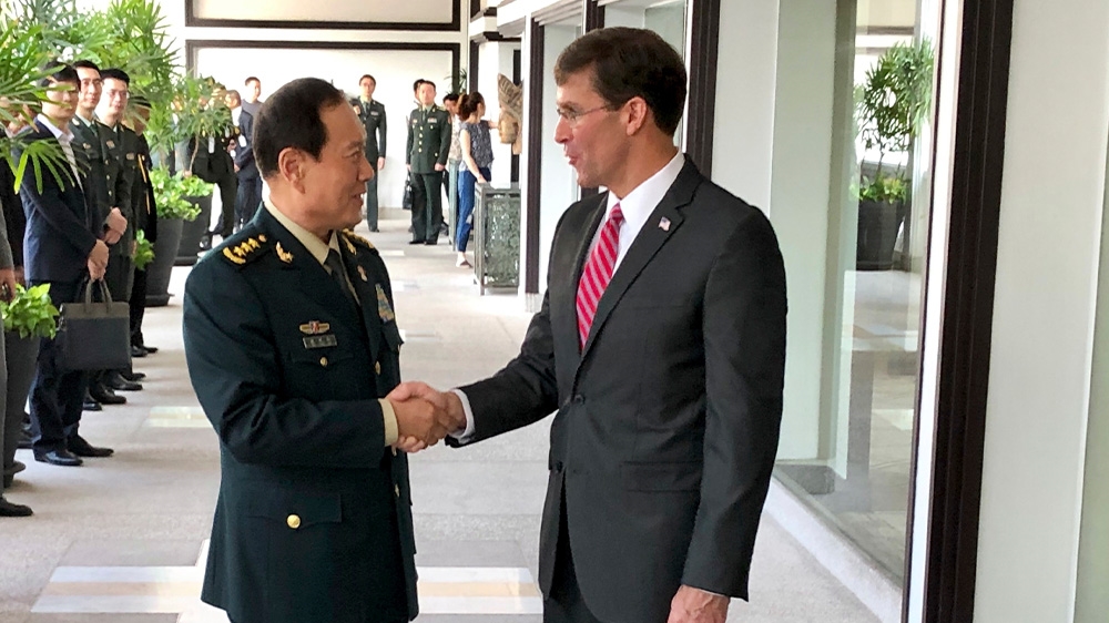 The South China Sea and Taiwan were top of the agenda as China’s Defence Minister Wei Fenghe (left) and US Defense Secretary Mark Esper met in Bangkok on Monday.