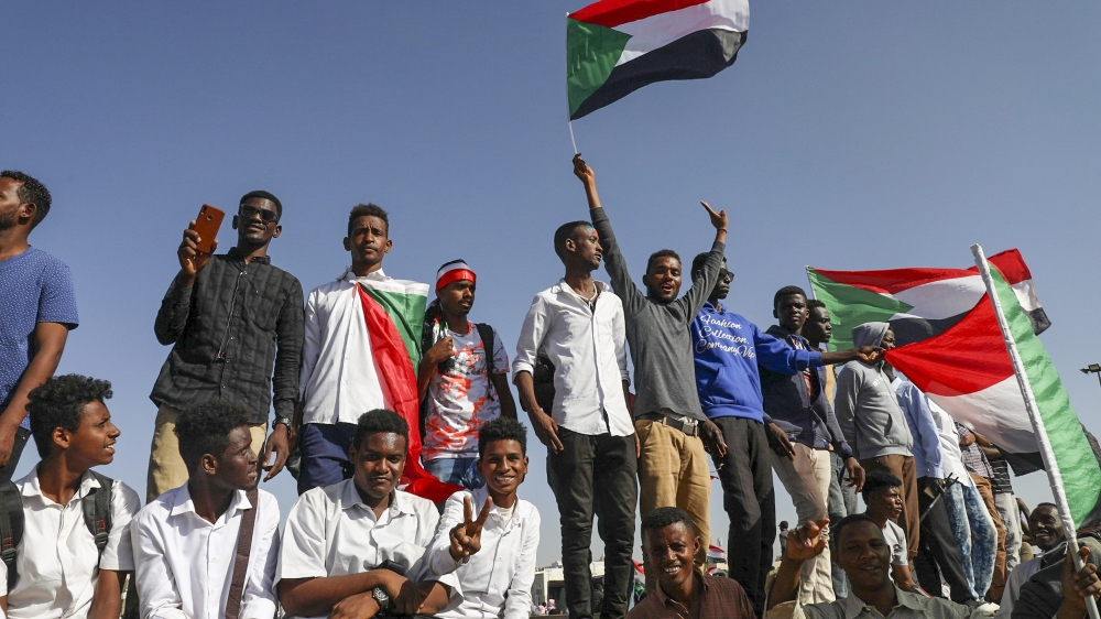 People gather as they celebrate first anniversary of mass protests that led to the ouster of former president and longtime autocrat Omar al-Bashir. in Khartoum, Sudan, Thursday, Nov. 19, 2019. (AP Pho