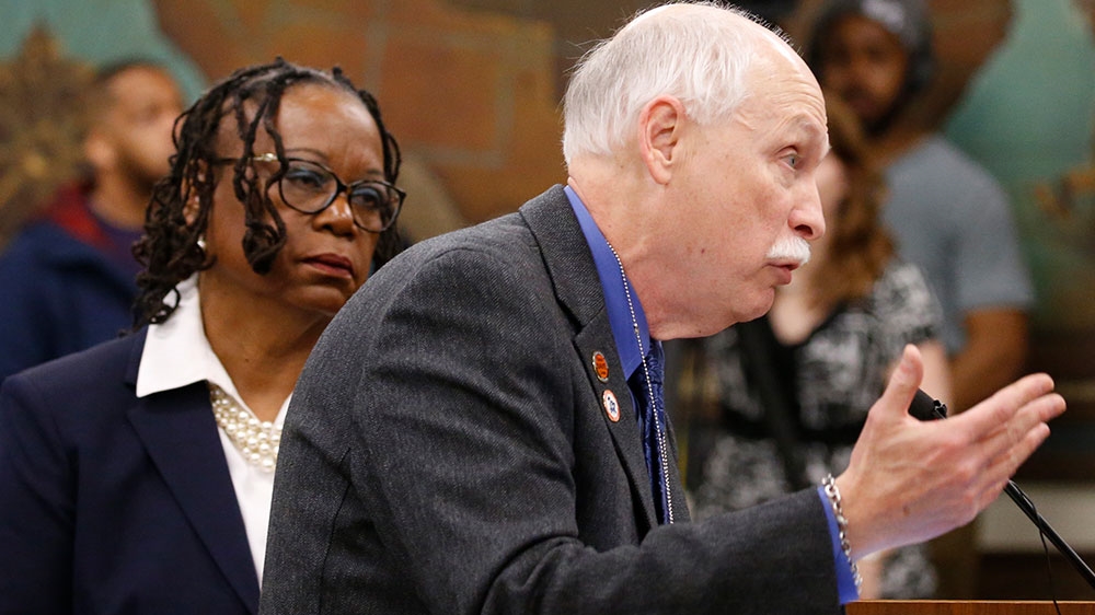 Philip VanCleave gestures during the meeting of the Senate Judiciary Committee at the Capitol in Richmond, Virginia
