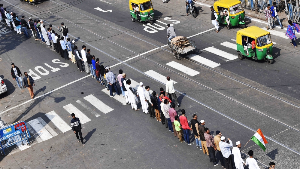 Protesters in Kolkata city organised an 11km human chain