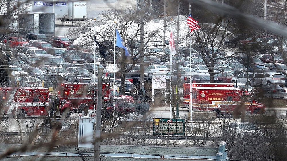 Emergency vehicles are parked near the entrance to Molson Coors headquarters in Milwaukee, Wisconsin