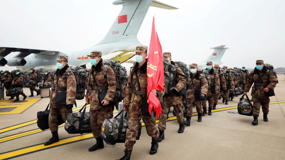 Chinese People's Liberation Army (PLA) Air Force aircraft arrive at the Wuhan Tianhe International Airport with medical personnel and supplies to help fight the outbreak of the new coronavirus