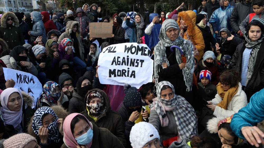 women in Moria protest - reuters