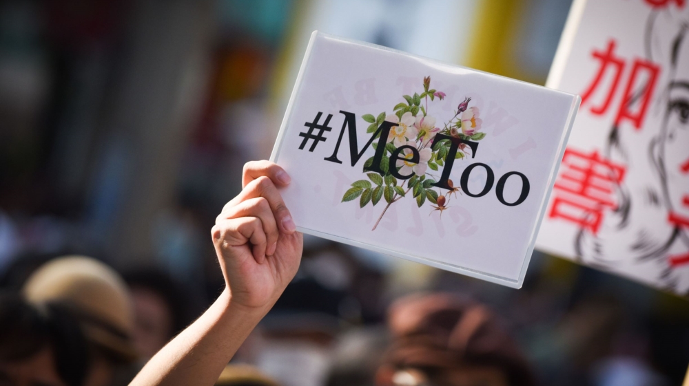 A demonstrator in Tokyo, Japan holding a ‘#MeToo’ sign – the movement began in the US but quickly united millions around the globe against sexual harassment and violence