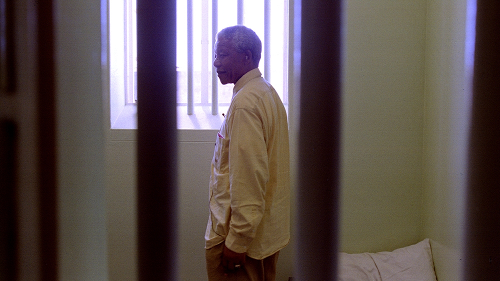 African National Congress ( ANC ) president Nelson Mandela in the prison cell he occupied on Robben Island for much of his 27 year incarceration, February 11th. Mandela''s visit to the island, about 5