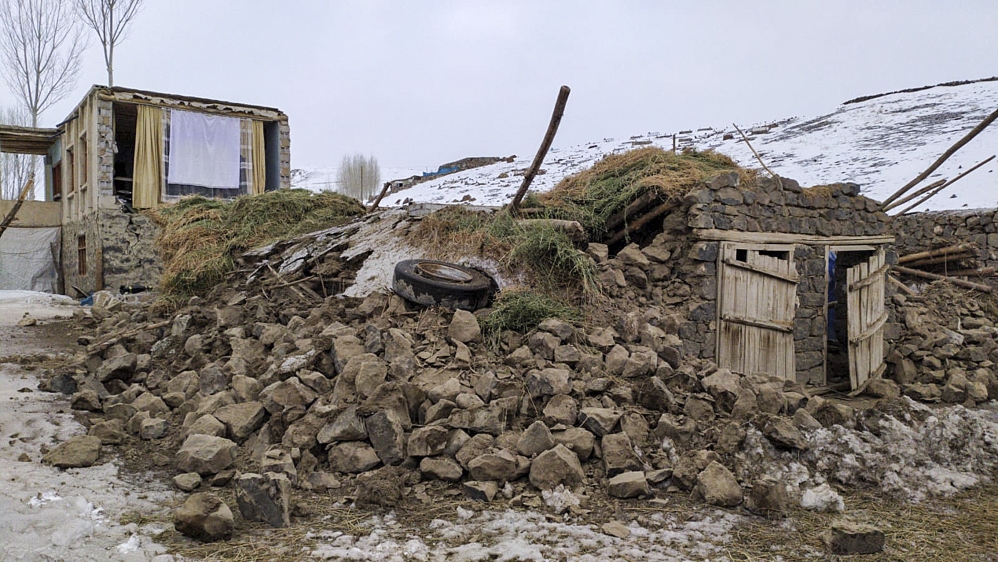 Wreckage of a mud-brick construction is seen after tremors from a 5.7-magnitude quake centered in northwestern Iran were also felt in Turkey's Van province, on February 23, 2020. At least seven people