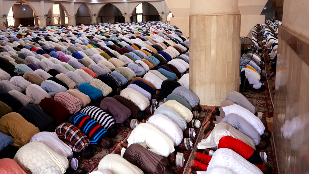 Muslim faithful attend Friday prayers at the National Mosque in Abuja