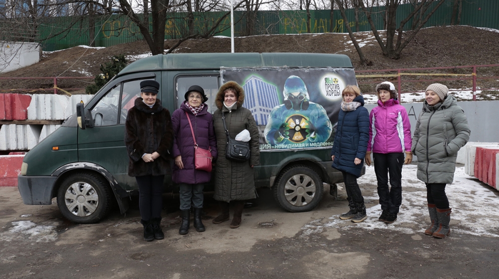 Local residents and activists set up a mobile headquarters to their struggle – a van, next to the polluted hill