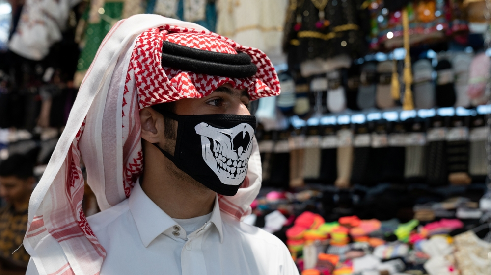 A man wears protective face mask, following the outbreak of the new coronavirus, in Kuwait, February 25, 2020. Picture taken February 25, 2020. REUTERS/Stephanie McGehee