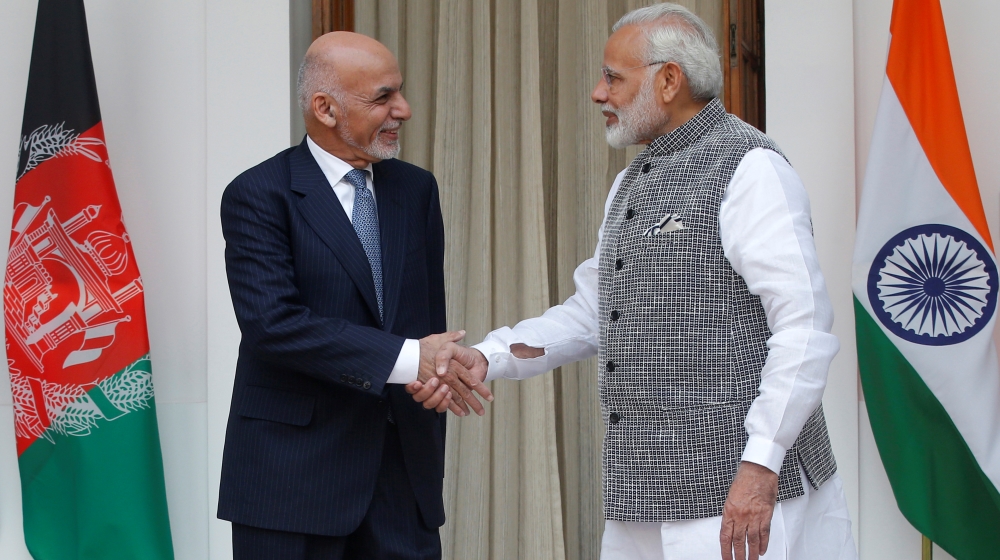 Afghanistan''s President Ghani shakes hands with India''s PM Modi during a photo opportunity before their meeting at Hyderabad House in New Delhi